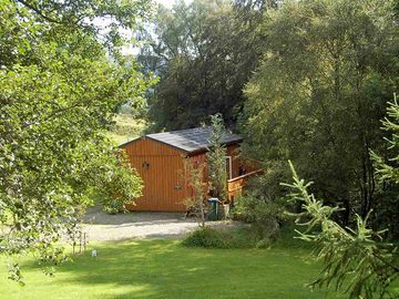 Waterfall log cabin