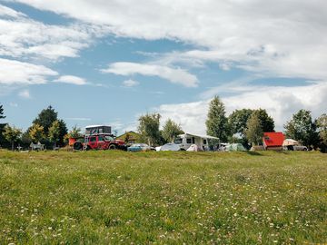 Lower part of the campsite, with a stunning view of the alps