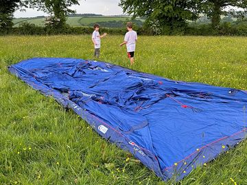 Guests pitching a tent
