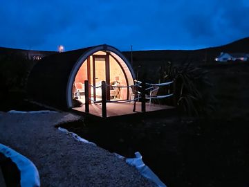 Pod lit up at night
