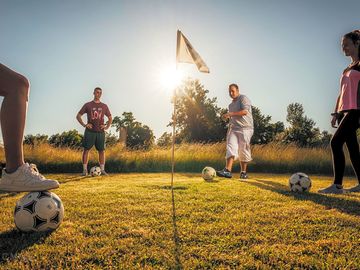 Play a round of football-golf