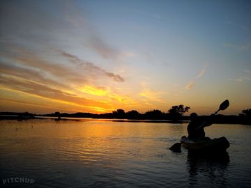 Kayaking trip at sunset