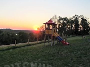 Sunset over wildflower glamping