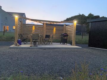 Private terrace lit up at night