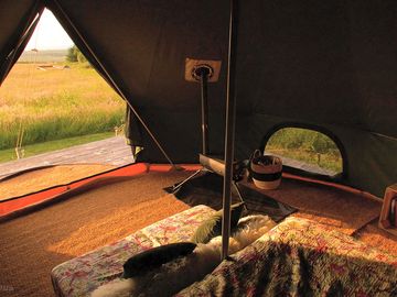 A camping stove to keep warm on a chilly evening