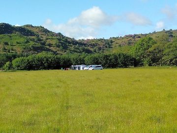Non-electric grass tent or trailer tent pitch