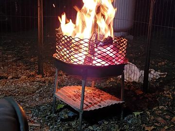Pull-through sites include a wooden picnic table and portable fire-pit