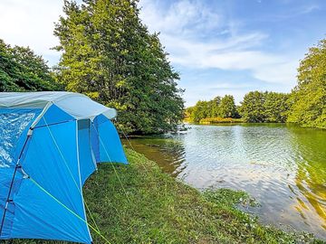 Side Photo of the tent at the Lake