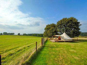 The bell tent pitch and views