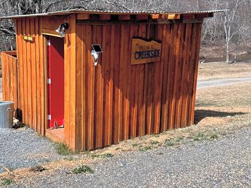 Bathroom and outdoor shower near entrance