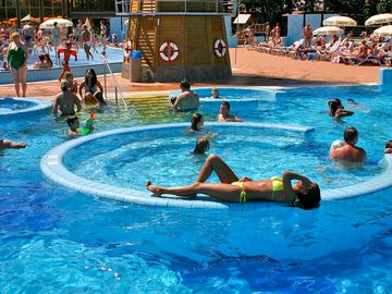 Swimming pool with whirlpool tub