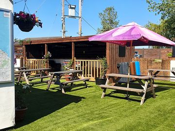 The yard now has astro-turf. not quite a bowing green but still nice to hang about on