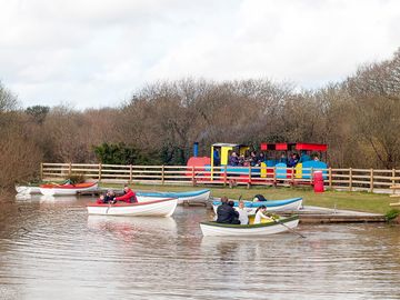 Boating lake as train goes by