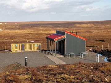 The facility block with moorland backdrop