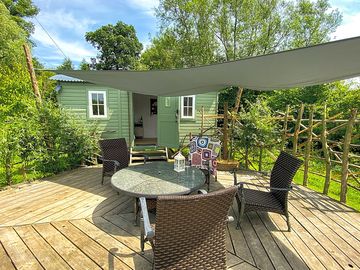 Out door seating area to shepherds hut