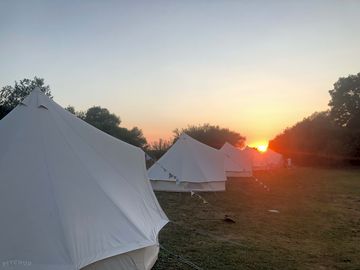 Sunset over the bell tents