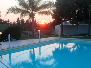 Sunset by the pool