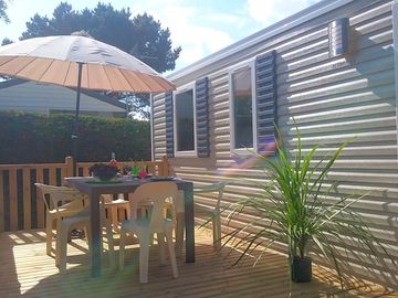 Outdoor deck with garden furniture
