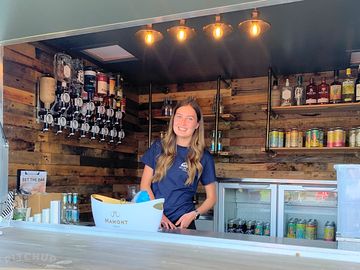 Staff member in gin & fizz bar
