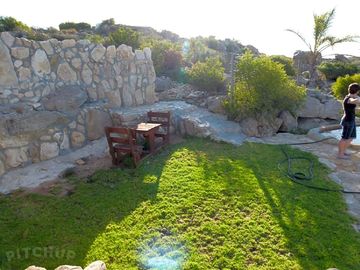 Picnic table next to the splash pool
