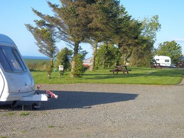 Touring pitches with electric hook-up and room for awning