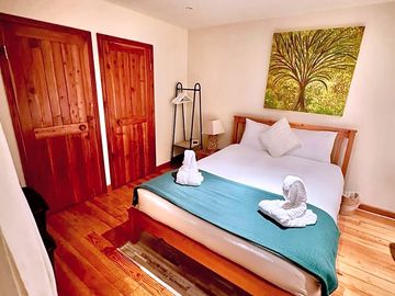 Bedroom with linen and towels supplied