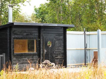 Wood-fire sauna in the wild spa