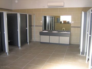 Modern, spacious toilet and shower block