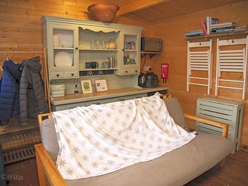 Sofa bed and kitchen