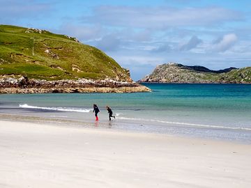 Walking the tide-line at reef beach, uig, isle of lewis, outer hebrides.