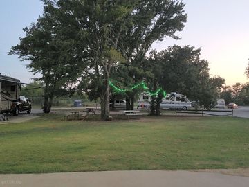 Small park with grassy areas and trees