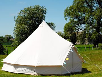 Bell tent set up on grass