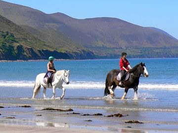 Horse riding on rossbeigh beach glenbeigh, co. kerry