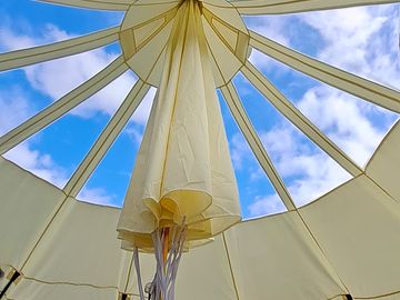 You can watch the sky inside the tent while staying dry