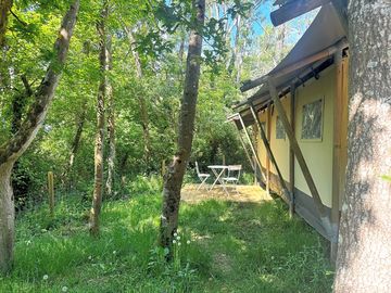 Each tent has a separate, more private, seating area towards the rear of the accommodation