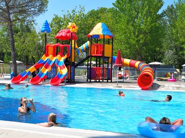 Swimming pool with slides
