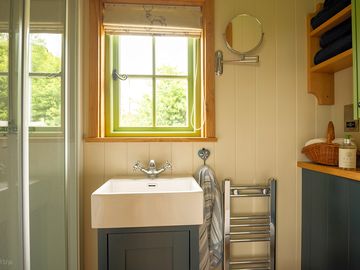 Enjoy the comfort of your private ensuite, complete with a shower and modern flushing toilet.