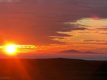 Sunset across the outer isles taken from the meadow garden