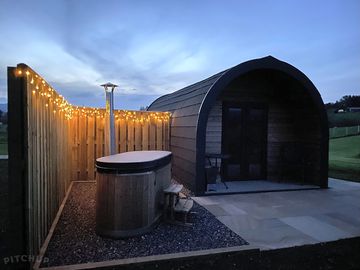 Hot tub lit up at night