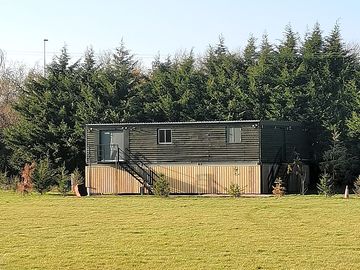 Front view of the toilet and shower building