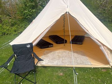 Airbeds, rug and a camping chair provided