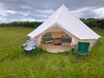 Bell tent situated on the edge of the site