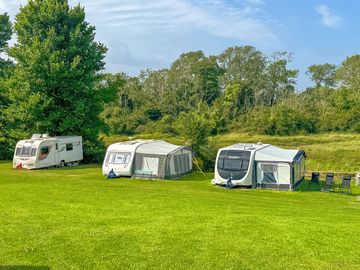 Spacious pitches by the river