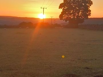 The sun setting over chatsworth