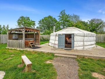 Exterior of the yurt and the hot tub
