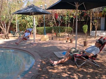 Relaxing around the pool