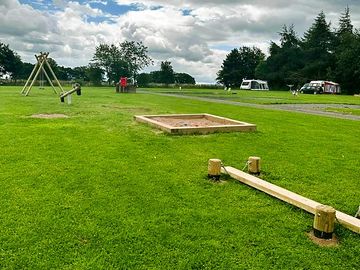 Gallowhill park, wobble board, sand pit, 4 person seesaw and 2 swings