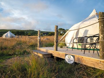 Our luxury glamping belle tents, furnished with a comfortable double bed and various cosy amenities