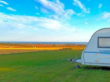 Pitches with distant sea views