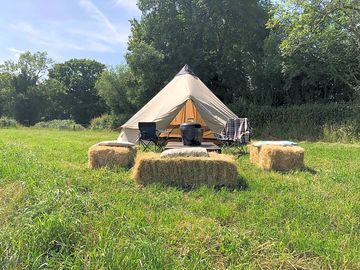 Hay bales around a firepit